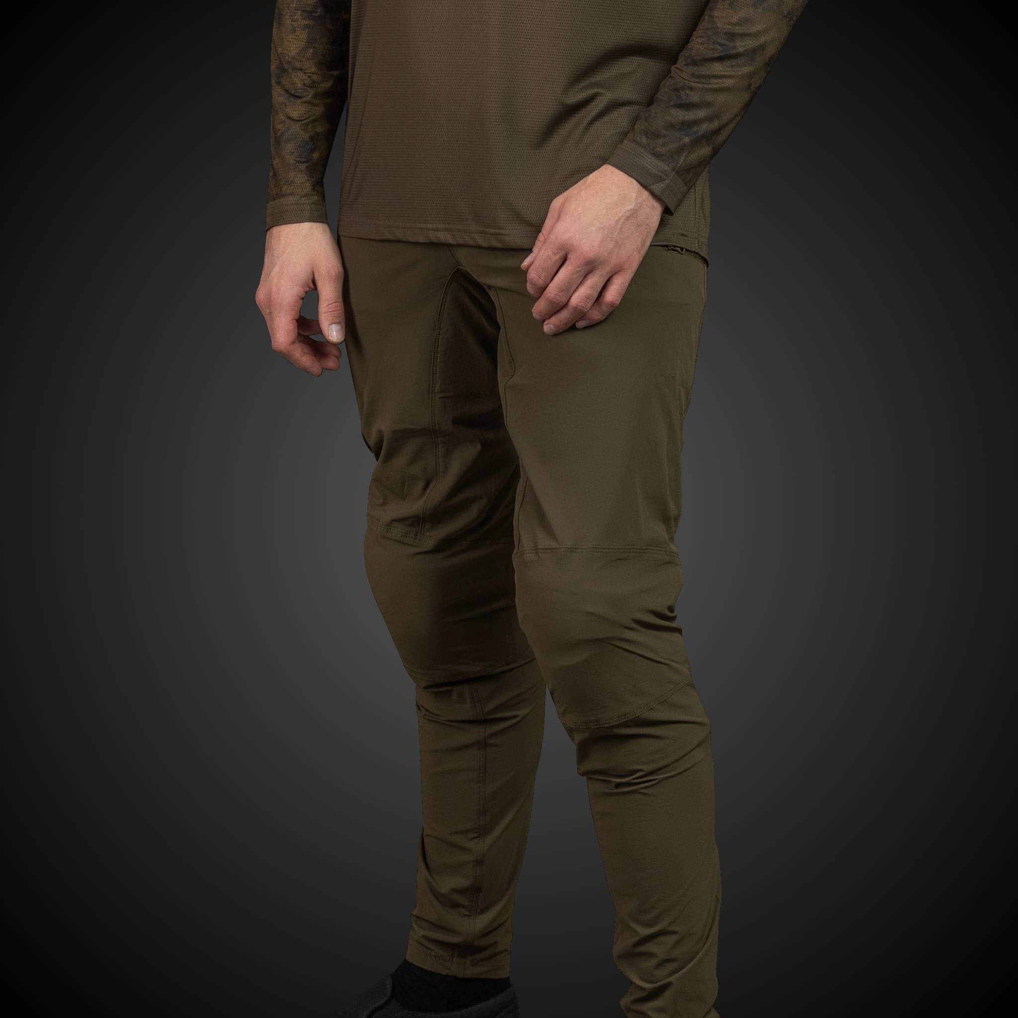 Adventure-ready Gravity 1.02 khaki pants, tailored for mountain bikers seeking comfort and durability in extreme conditions