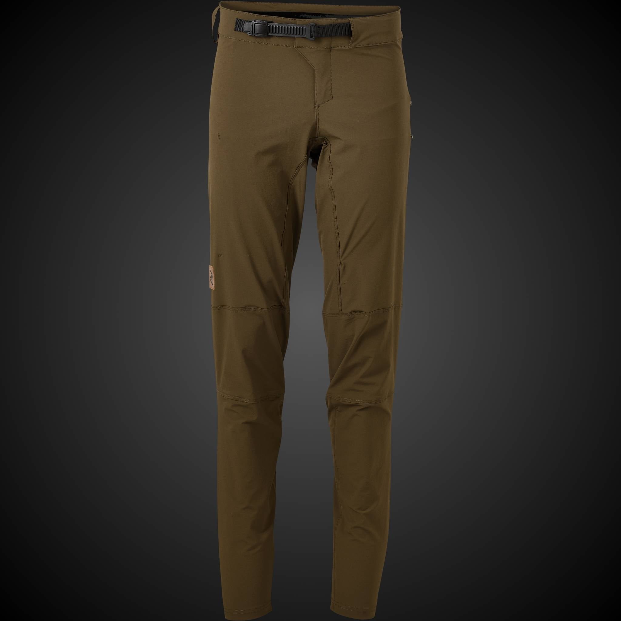 Khaki Gravity 1.02 mountain bike pants designed for rugged terrain, offering comfort and resilience in all weather conditions.