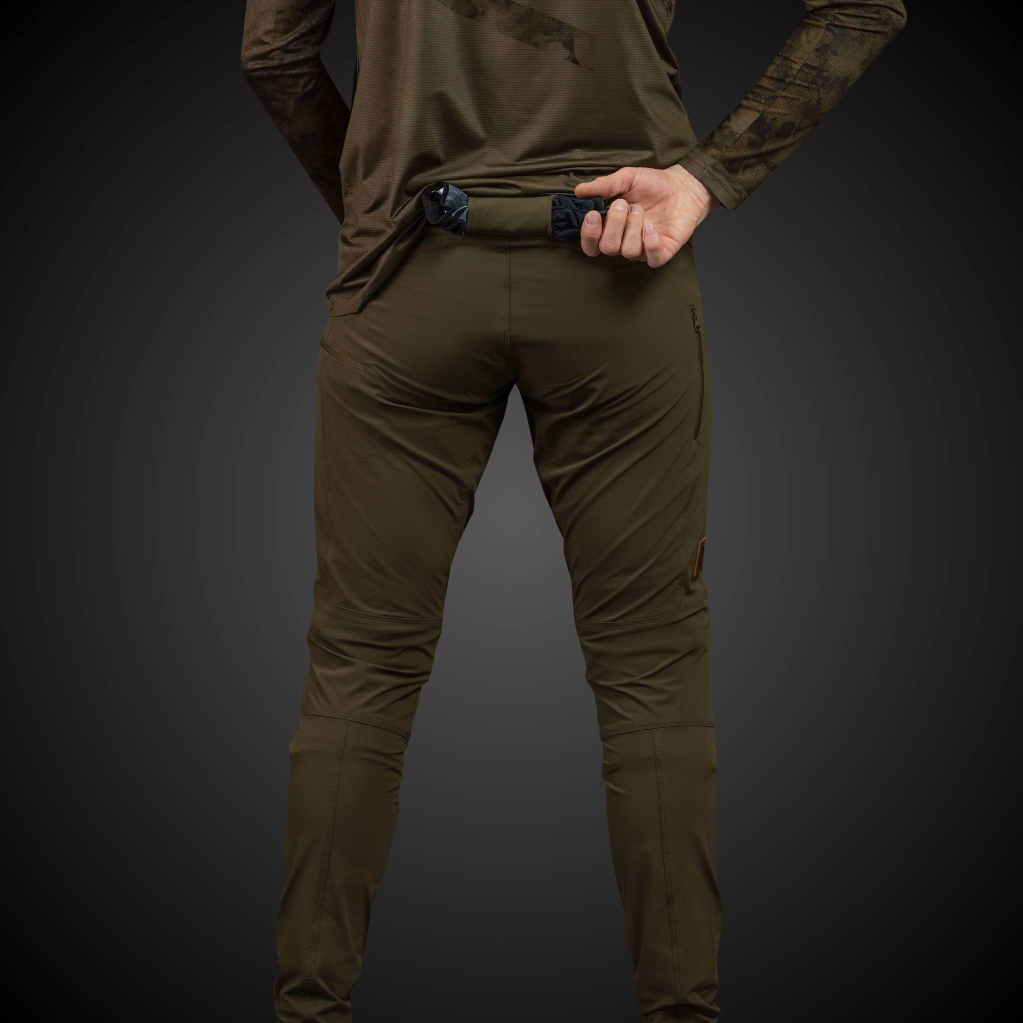 Durable khaki MTB pants from the Gravity 1.02 series, crafted for optimal performance and comfort in diverse biking environments