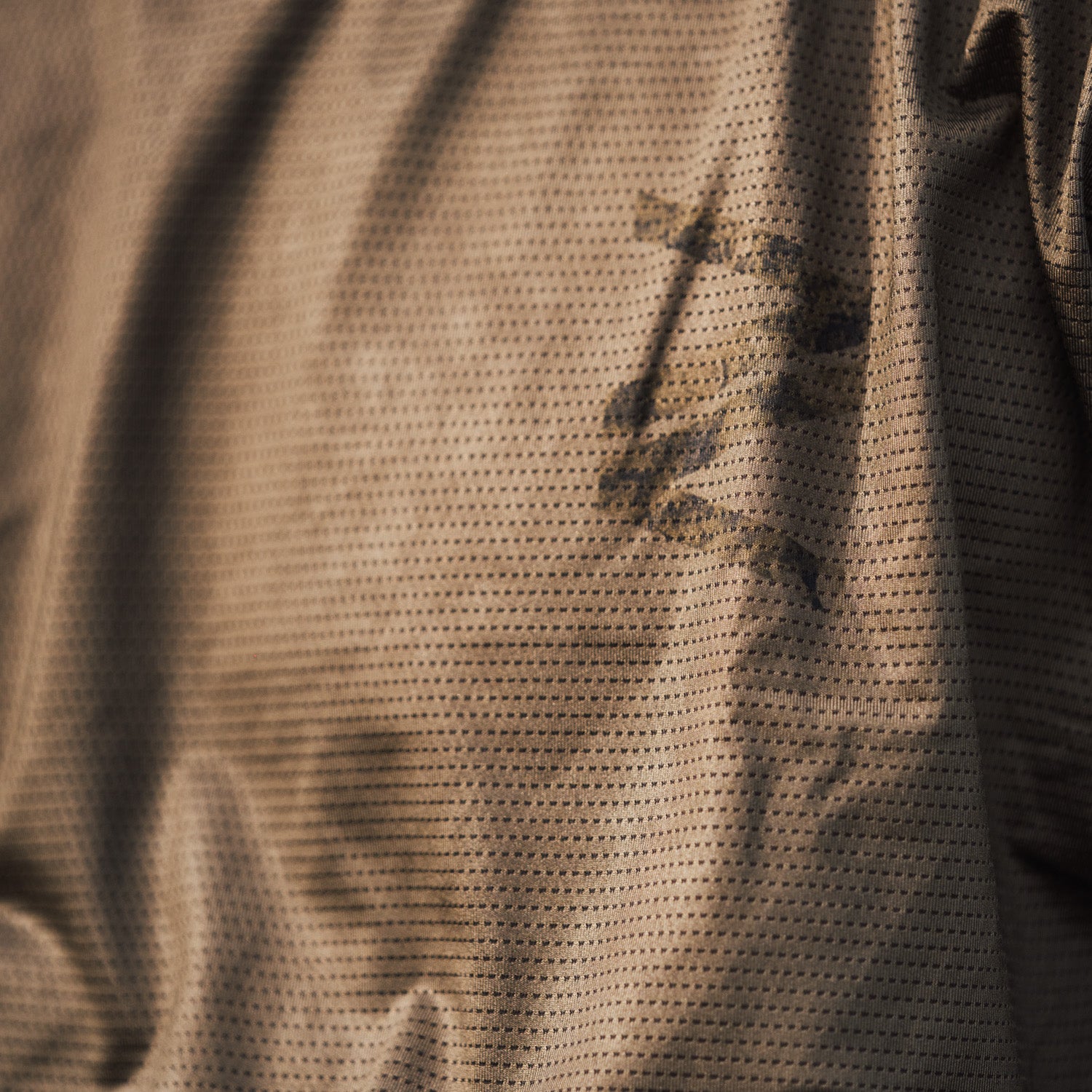 Stretchable and sustainable khaki jersey for mountain biking, tailored for long-sleeve comfort in downhill and enduro riding.